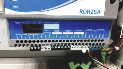 Gray and blue industrial control panel labeled rdr2sa with digital display and wiring for kryptonite cmt22a access control system