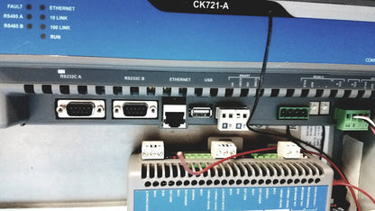 Gray industrial control panel showing multiple ports including rs232c ethernet and usb connectors on kryptonite cmt22a access control system back side
