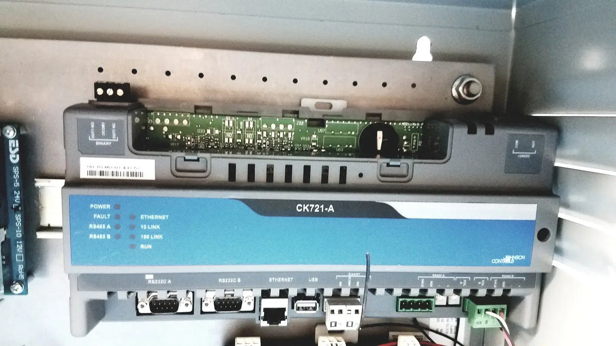 Gray and blue industrial network switch ck721-a with multiple ports and indicator lights for kryptonite cmt22a access control system