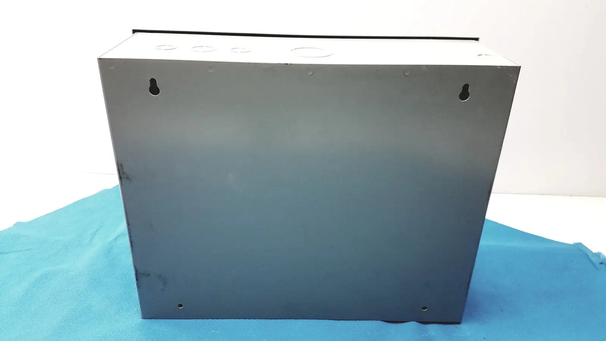Gray metal electrical junction box with mounting holes and circular cutouts for kryptonite cmt22a access control system