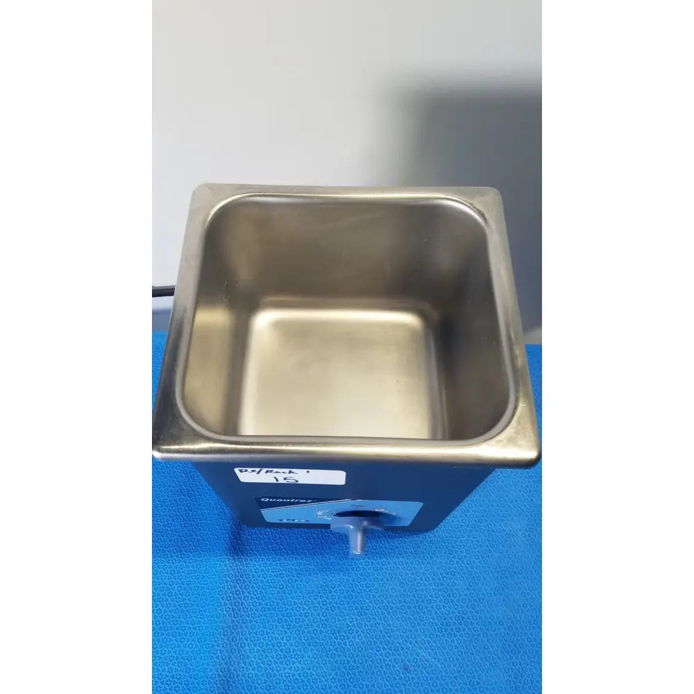 Stainless steel rectangular ultrasonic cleaner tabletop tank with blue base and control panel L&R Quantrex Q90 ultrasonic