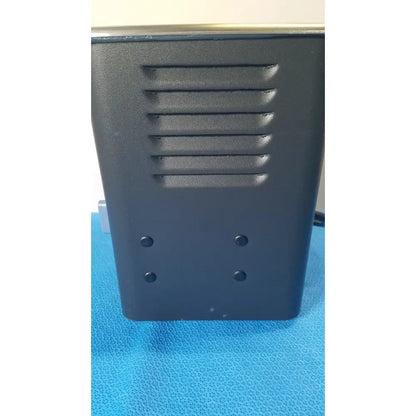 Black rectangular electronic device with ventilation slits and mounting holes on back of l&r quantrex q90 ultrasonic cleaner tabletop tank