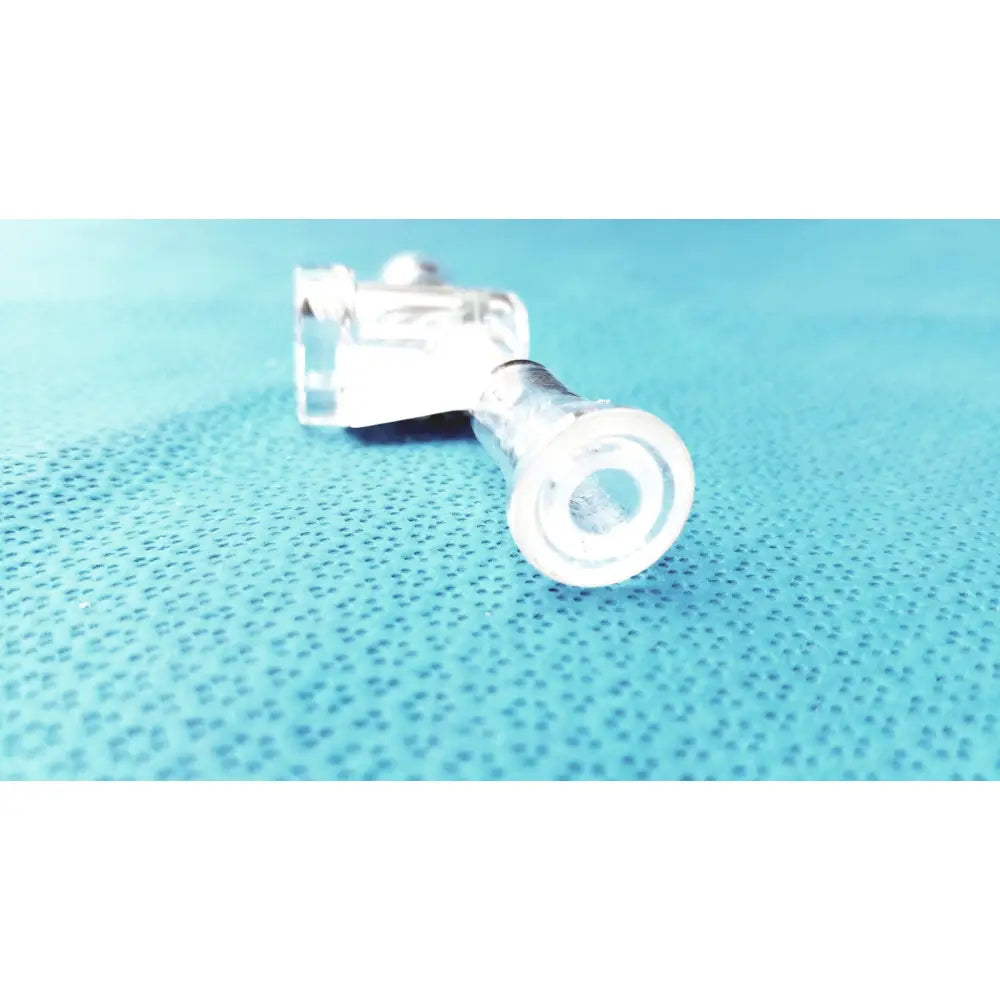 Clear plastic lab glass adapter with cylindrical body and threaded end featuring stopcock valve for precise flow control