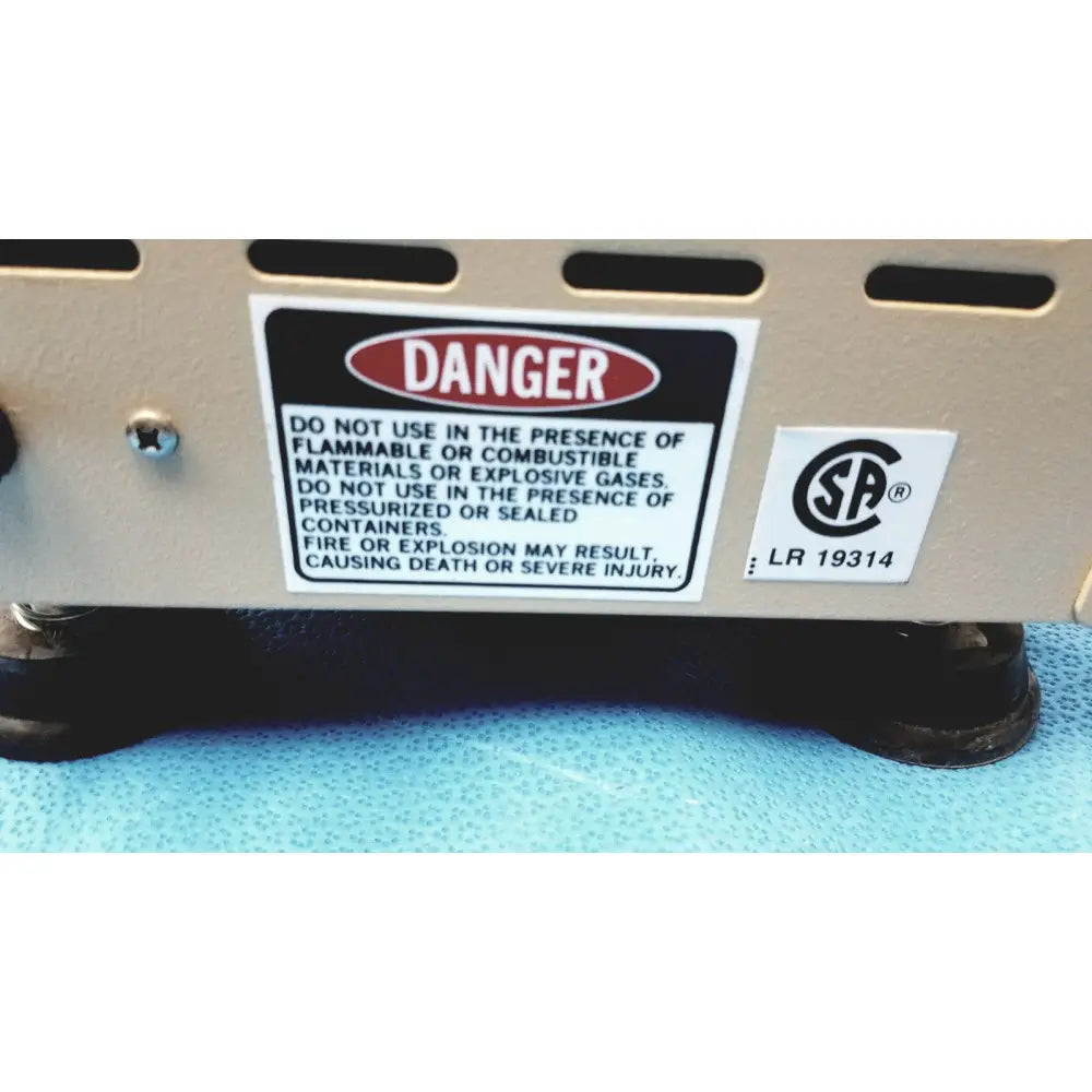 Beige lab-line 4600 multi-mixer platform shaker with black warning label and csa certification sticker lab equipment