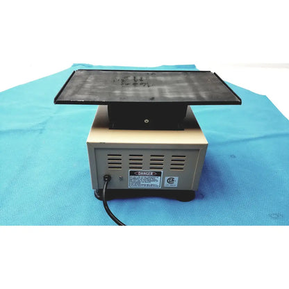 Black rectangular magnetic stirrer with beige base and ventilation slots for lab-line 4600 multi-mixer platform shaker lab equipment