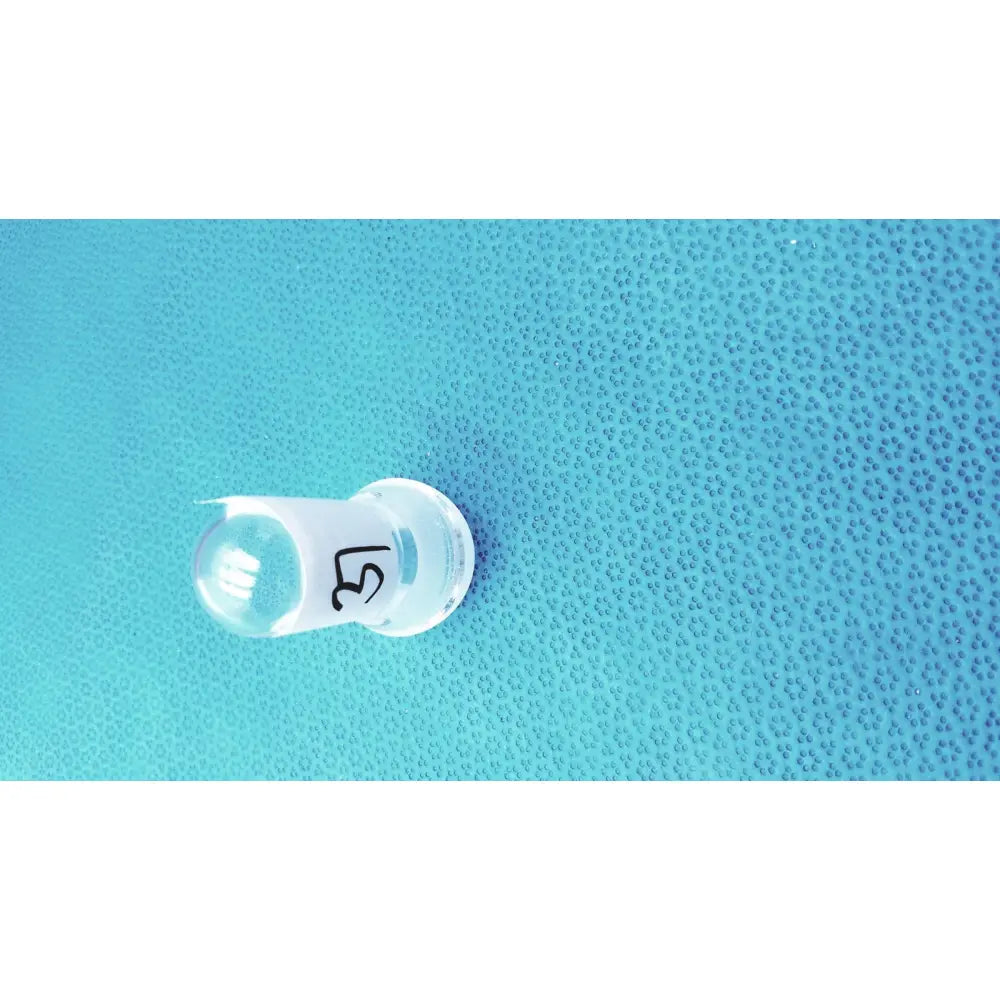 Clear plastic borosilicate lab spherical joint glass stopper vial with white label marked 37 and rounded cap