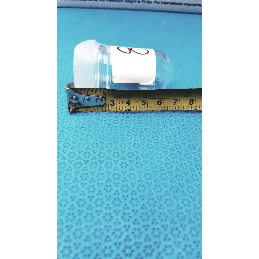 Clear plastic lab spherical joint vial with white cap and red number 8 label for spherical joint glass stoppers