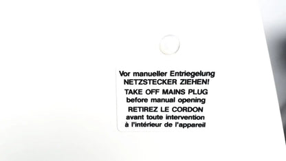 White rectangular label with black text in three languages instructing mains plug removal before manual opening on labnet hermle z 200 a centrifuge back side for reuse medical equipment