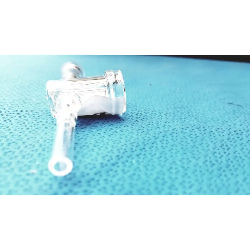 Clear glass laboratory glass adapter stopcock valve with metallic silver cap and 24/40 borosilicate glass joint