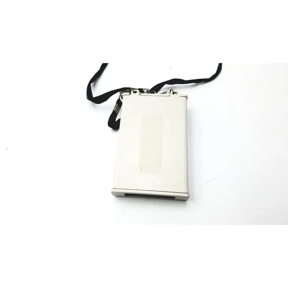 White rectangular laerdal compact suction unit with black strap attached to top for portable medical use untested