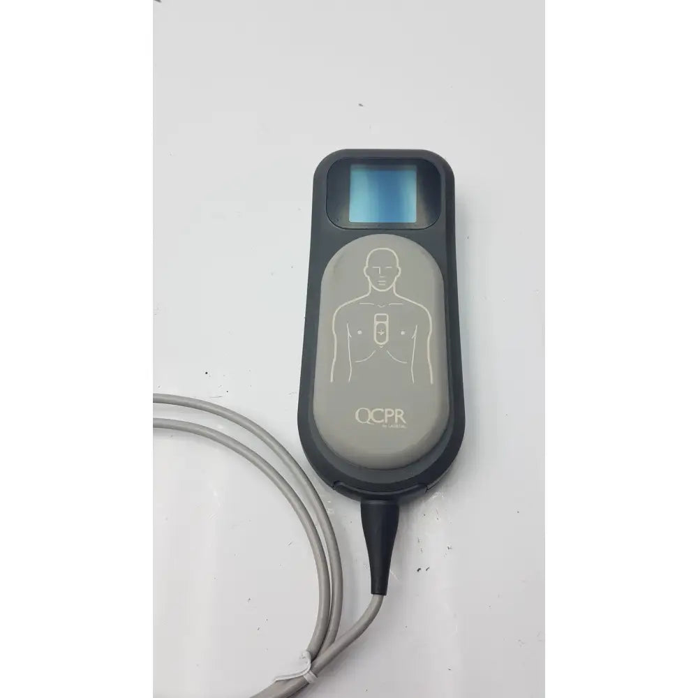 Gray and black laerdal cpr meter with small screen chest diagram and attached gray cable for emergency use