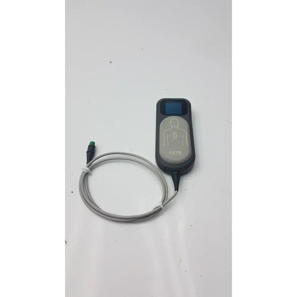 Gray and black laerdal cpr meter defibrillator monitor with coiled gray cable for emergency use