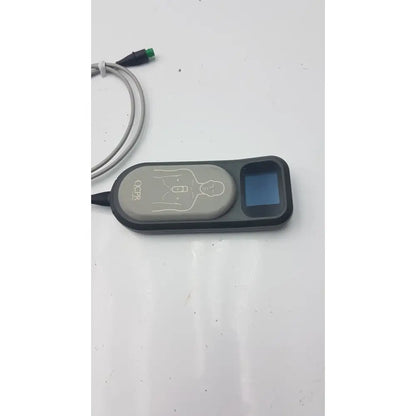 Gray and black laerdal cpr meter with small screen diagram of chest compression points and attached cables for cpr use
