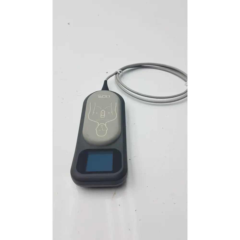 Gray and black Laerdal CPR meter 453564257691 with screen electrode pad diagram and attached cable for automated external defibrillator use
