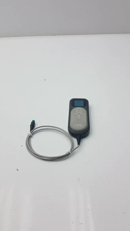 Black and gray laerdal cpr meter with coiled cable for effective cardiopulmonary resuscitation monitoring