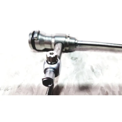 Silver laparoscopic hysteroscopy diagnostic sheath with textured knob and polished metal shaft for precise endoscopy