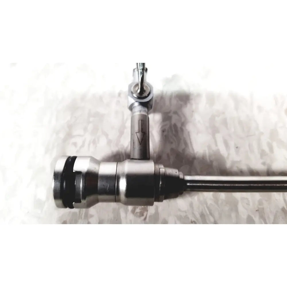 Silver laparoscopic hysteroscopy diagnostic sheath endoscope with cylindrical body, black rubber seal, and directional arrow