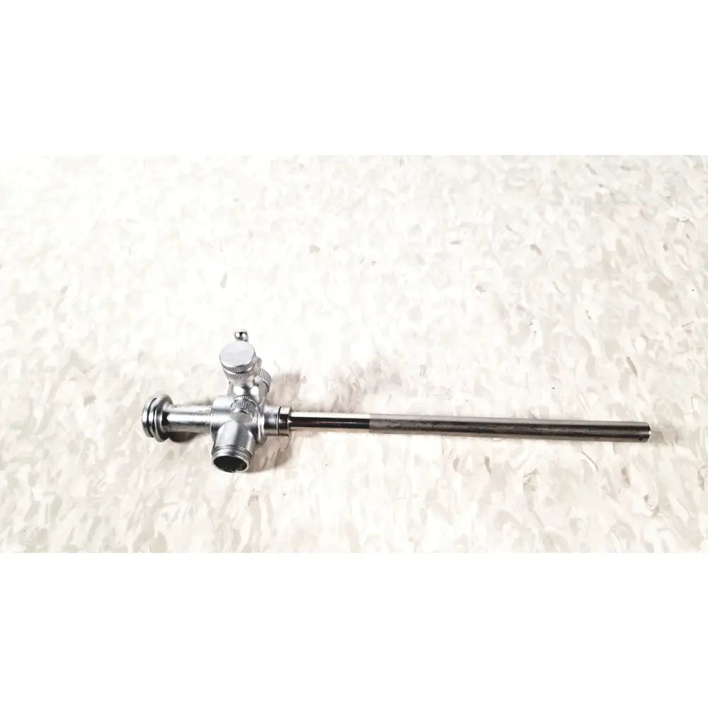 Silver metallic laparoscopic obturator with long slender shaft and three-way valve for reuse medical laparoscopic instruments