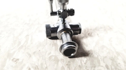 Black metal gas regulator with threaded ports and knurled knobs for laparoscopic obturator and reuse medical instruments