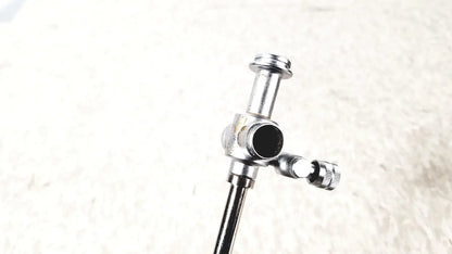 Silver-colored metal gas regulator with central valve knob for laparoscopic obturator with 5 fr instrument reuse medical use