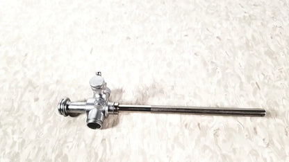 Silver metallic laparoscopic obturator with long slender shaft and three-way valve for reuse medical laparoscopic instruments