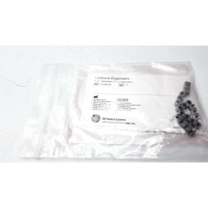Black plastic leadwire organizer with 4 3 lead separators and 2 4 lead separators in a clear bag lead separator ref 401089-003
