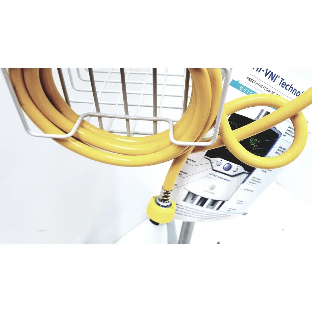 Yellow coiled hose with yellow threaded connector for leica eg1150h embedding center in laboratory use