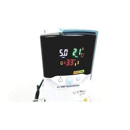 White medical ventilator with black digital display showing vital signs and hi-vni technology in leica eg1150h embedding center