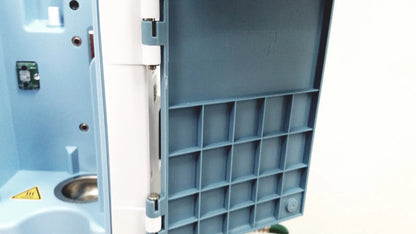 Blue plastic compartmentalized storage tray with white hinge and metallic latch for leica eg1150h embedding center