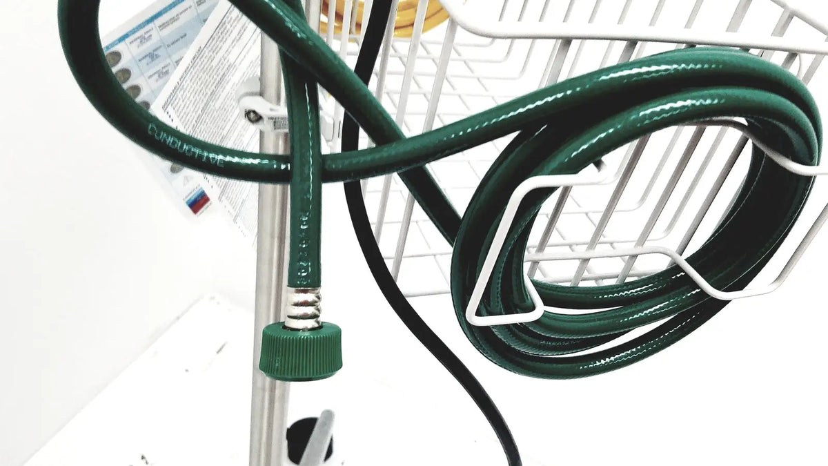 Green garden hose with metallic connector and green plastic cap for leica eg1150h embedding center use