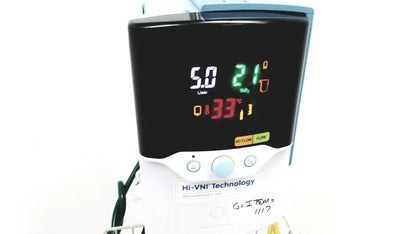 White medical ventilator with black digital display showing vital signs and hi-vni technology in leica eg1150h embedding center