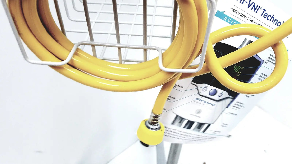 Yellow coiled hose with yellow threaded connector for leica eg1150h embedding center in laboratory use