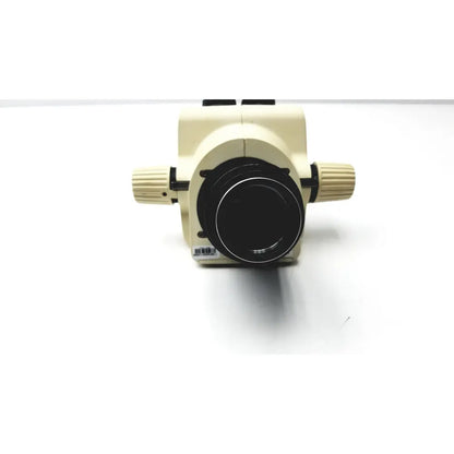 Cream-colored leica gz6e stereo zoom microscope with black objective lens and textured adjustment knobs