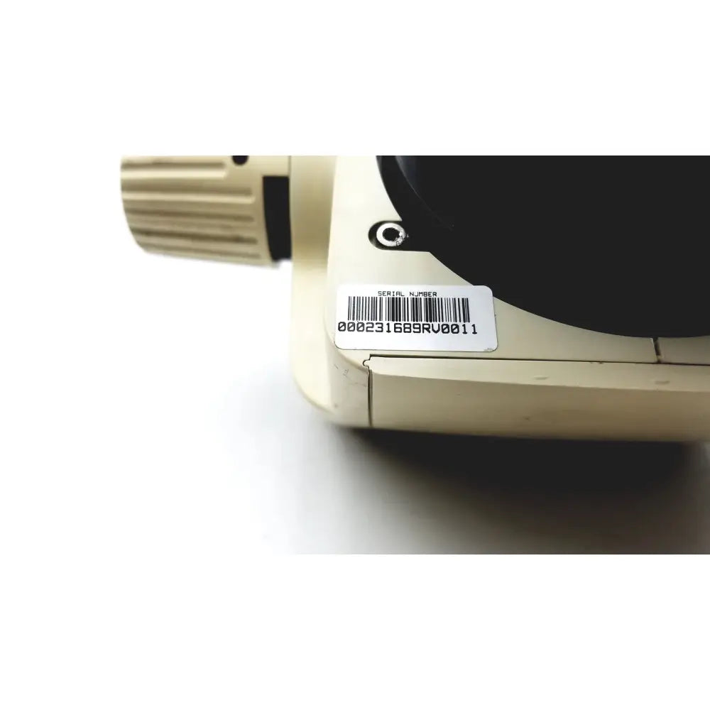 Beige leica gz6e stereo zoom microscope with black eyepiece and textured focus knob for precision observation