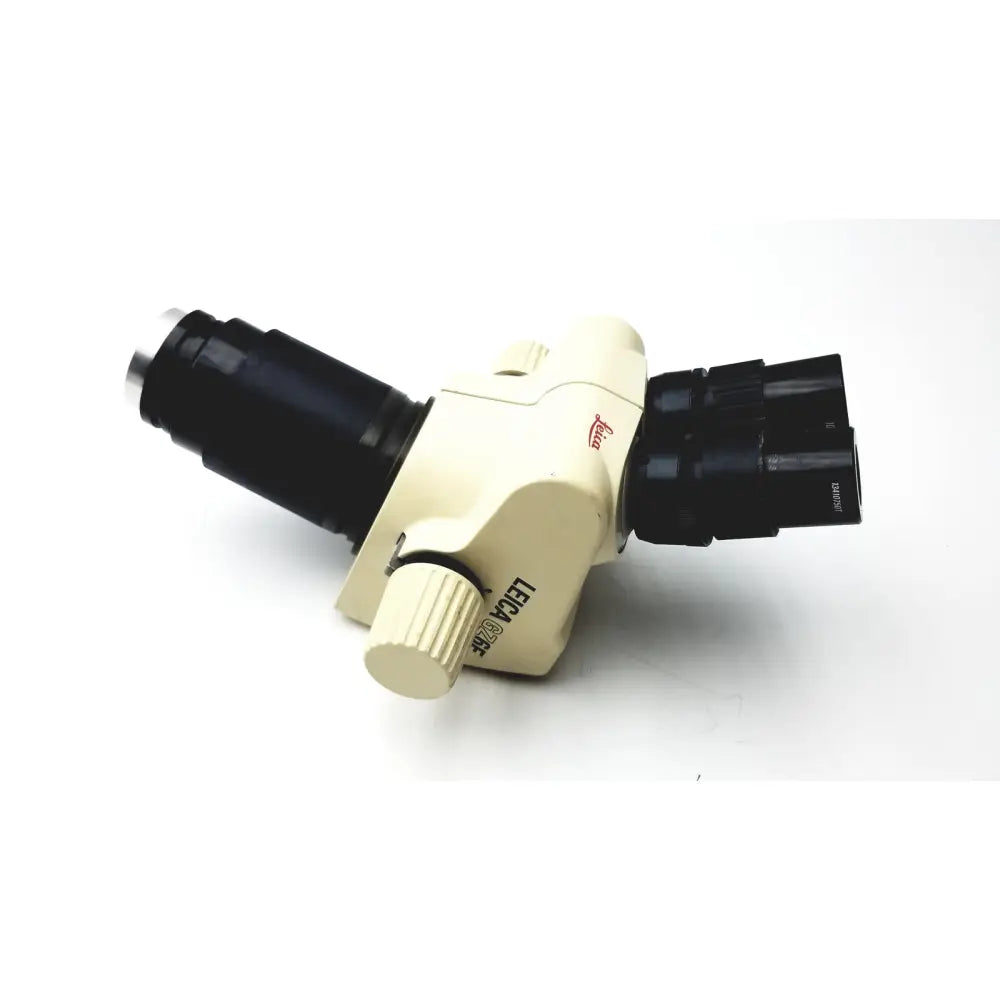 Beige leica gz6e stereo zoom microscope with black eyepieces and objective lenses for detailed laboratory use