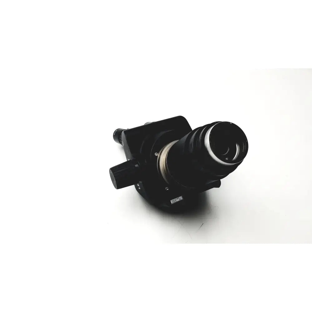 Black camera lens with metallic ring and matte finish mounted on leica gz6t stereo zoom microscope body