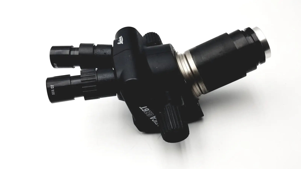 Black Leica GZ6T stereo zoom surgical microscope with metallic accents and labeled objective lenses for precision use