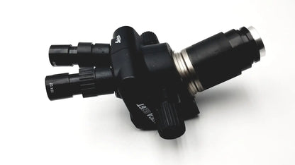 Black Leica GZ6T stereo zoom surgical microscope with metallic accents and labeled objective lenses for precision use