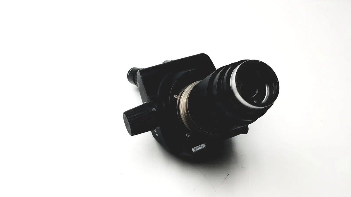 Black camera lens with metallic ring and matte finish mounted on leica gz6t stereo zoom microscope body