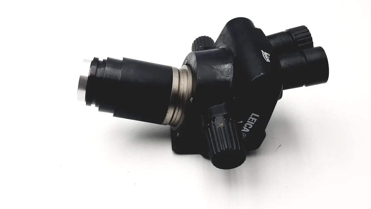Black Leica GZ6T stereo binocular microscope with metallic accents and textured adjustment knobs for precise zooming