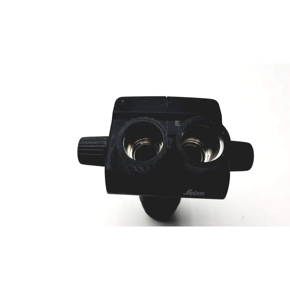 Black leica gz6t stereo binoculars with two circular lenses and textured side knobs for gz6t stereo zoom microscope part