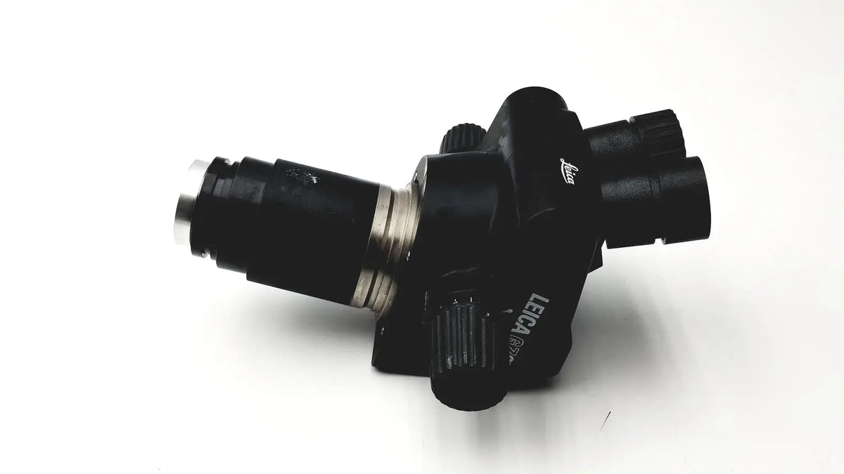 Black leica gz6t stereo zoom microscope with metallic lens barrel and textured adjustment knobs for precision use