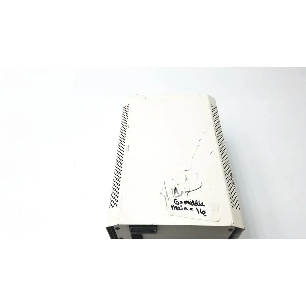 White rectangular power supply ballast lej mbq 52ac-z 310.26j with perforated sides and handwritten label on surface