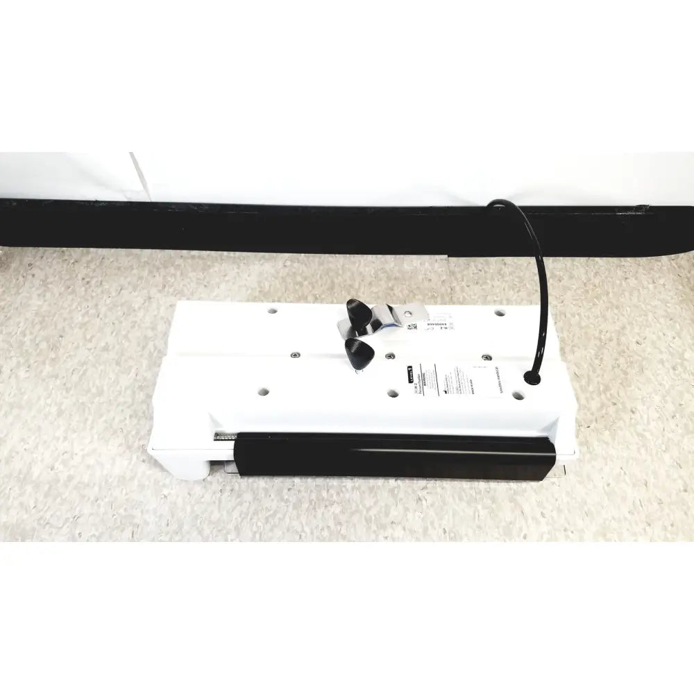 White and black desk lamp with curved arm and adjustable head for model h-2 pressure chambers use