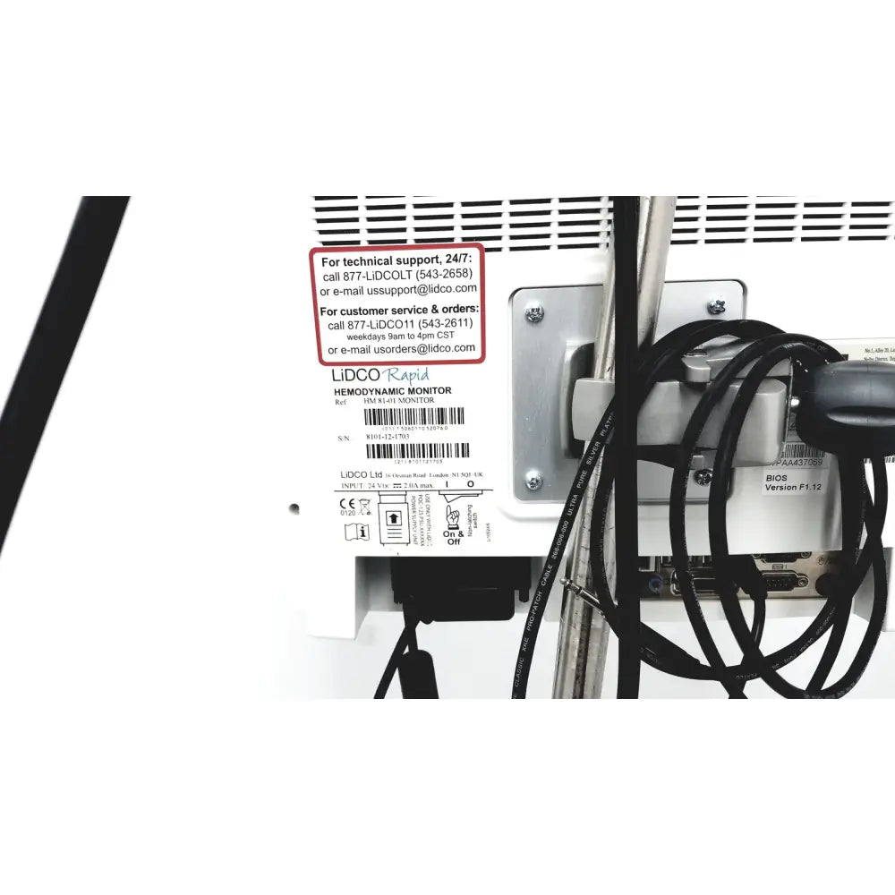 White plastic lidco hm-81-01 rapid hemodynamic monitor with power supply black cables and silver metal bracket
