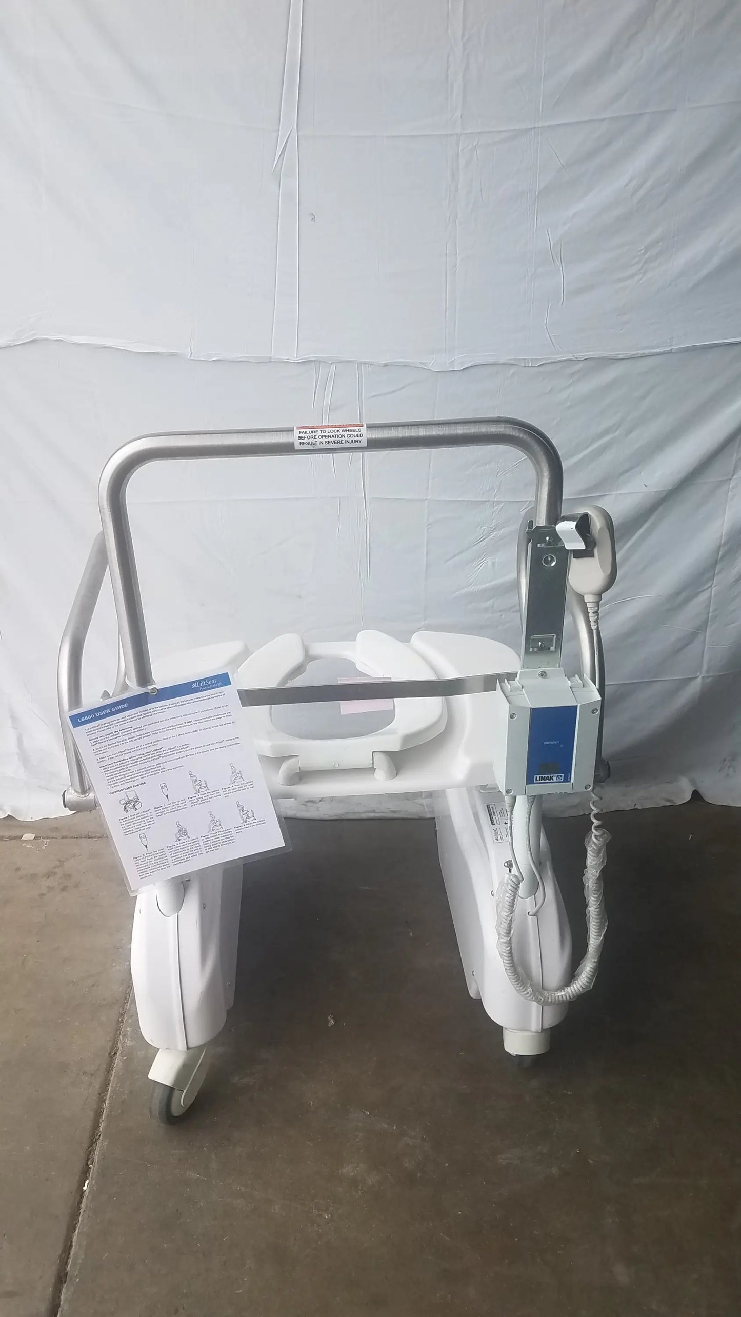 White plastic and metal liftseat ls600 bariatric power toilet lift with built-in toilet seat and wheels for easy transport
