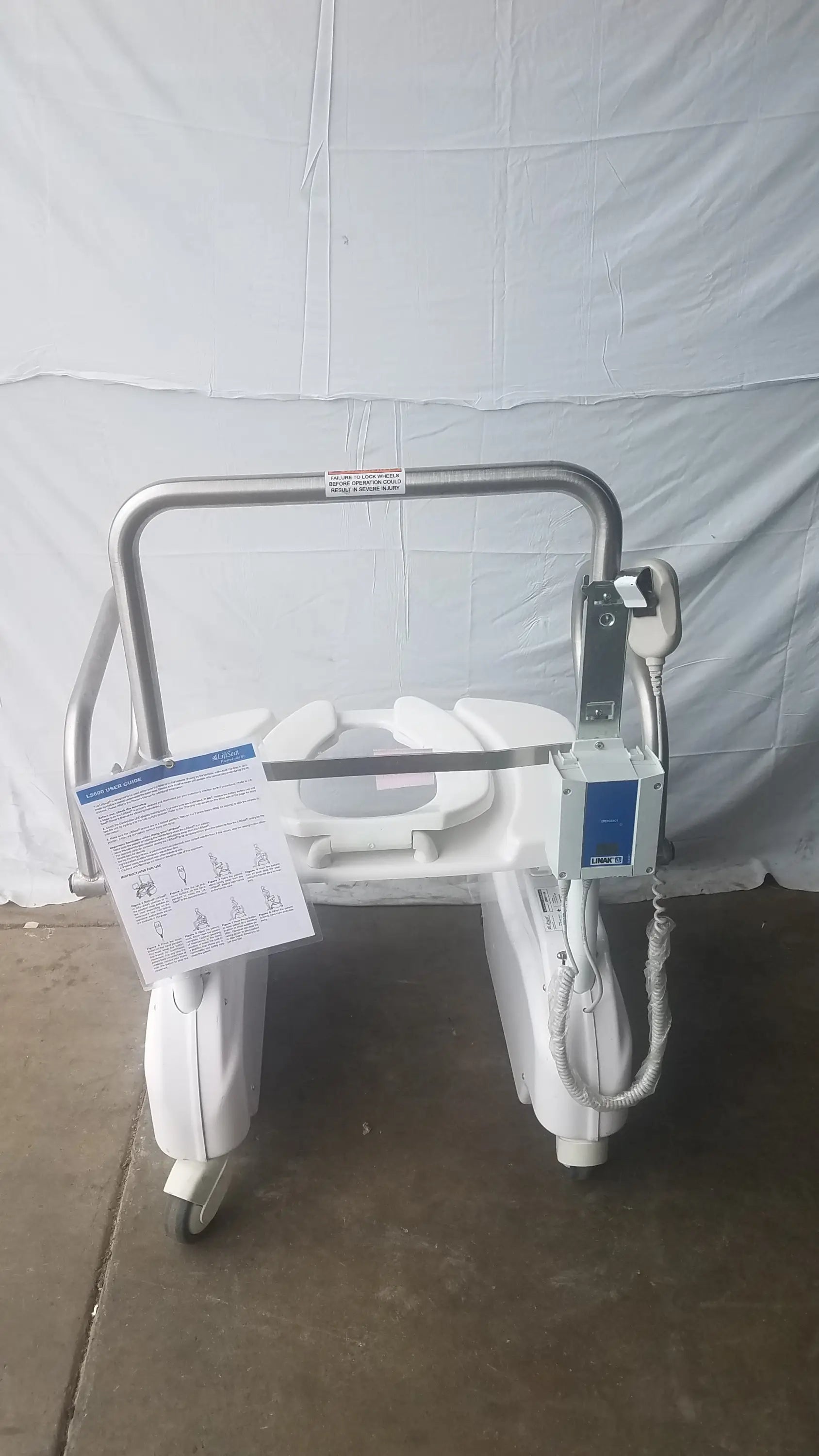 White plastic and metal liftseat ls600 bariatric power toilet lift with built-in toilet seat and wheels for easy transport