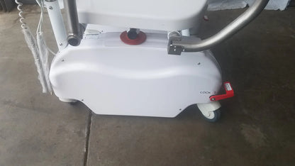 White bariatric power toilet lift with red lock lever and metallic arm for enhanced support and durability