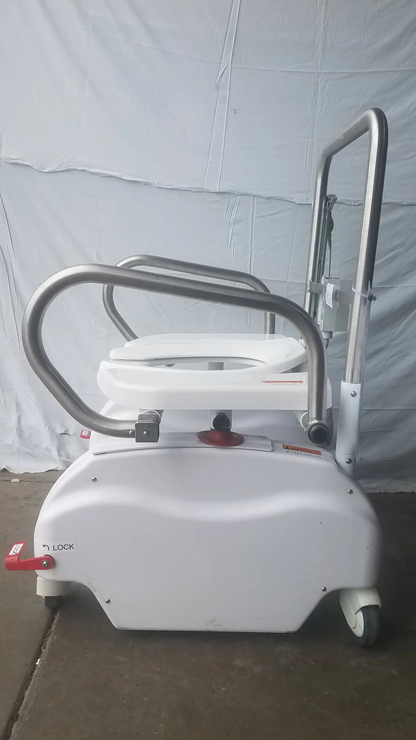 White liftseat ls600 bariatric power toilet lift with stainless steel frame and handlebars on wheeled base