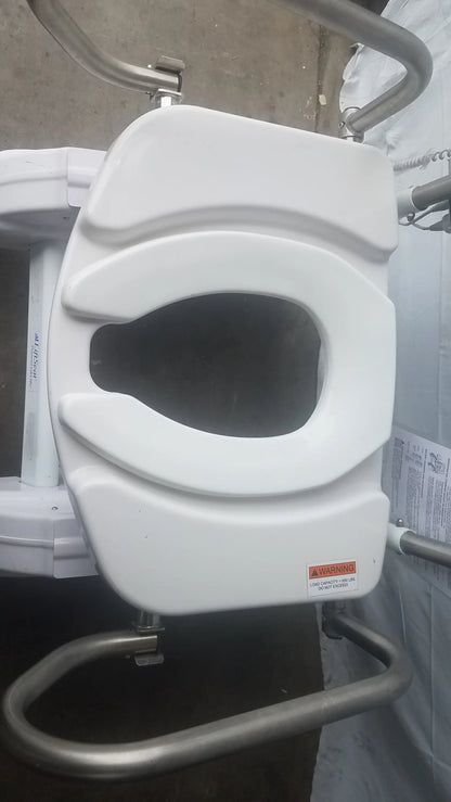 White plastic toilet seat with contoured design and metal support frame for liftseat ls600 bariatric power toilet lift
